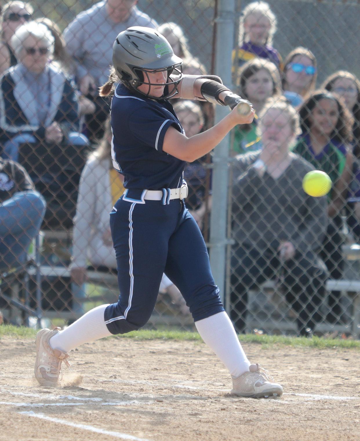 Louisville's Kenzi Denzer cracks a single in the first inning against Jackson at Jackson Friday, April 29, 2022.