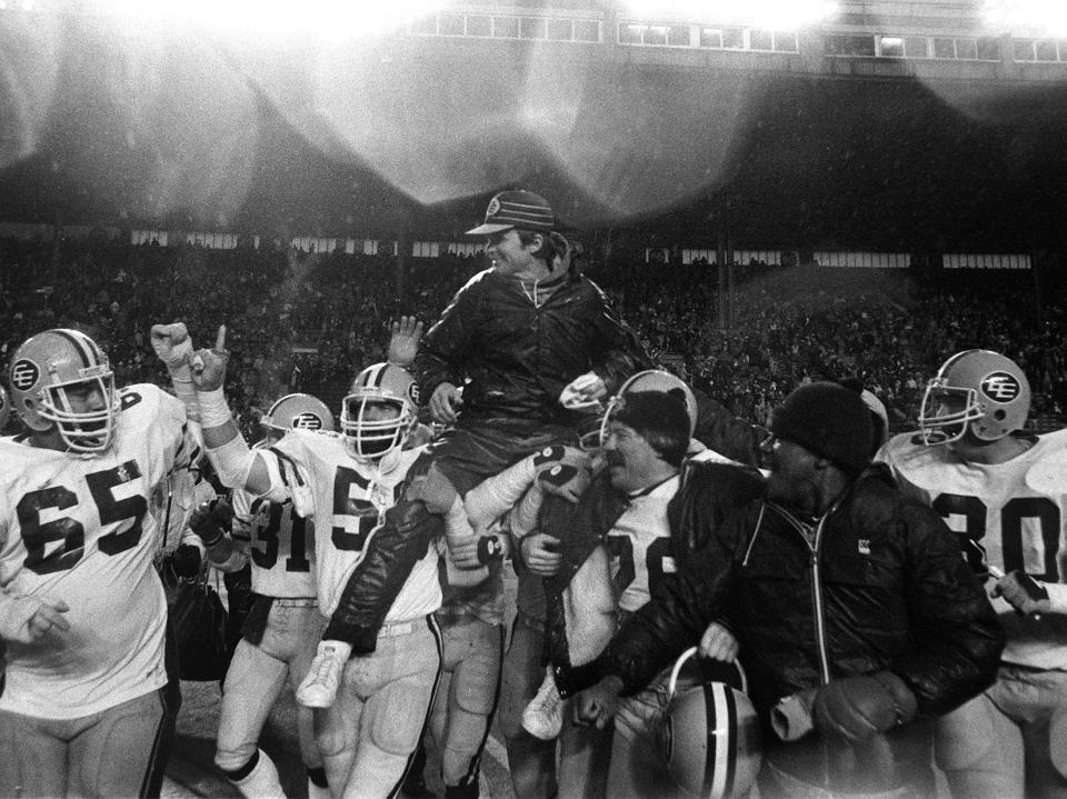 Edmonton Eskimos coach Hugh Campbell is carried on the shoulders of team members after they won their fifth consecutive Grey Cup by defeating the Toronto Argonauts in Toronto in 1982. (The Canadian Press)