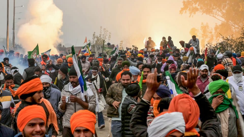 Police fire teargas to disperse farmers marching towards New Delhi during a protest at the Haryana-Punjab state border on February 21, 2024. - Narinder Nanu/AFP/Getty Images