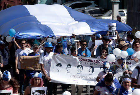 Nicaraguan expats living in Costa Rica take part in the "Caravan for Liberty and Justice" to protest against the government of Nicaraguan President Daniel Ortega, in La Cruz, Costa Rica border with Nicaragua, December 16, 2018. REUTERS/Juan Carlos Ulate