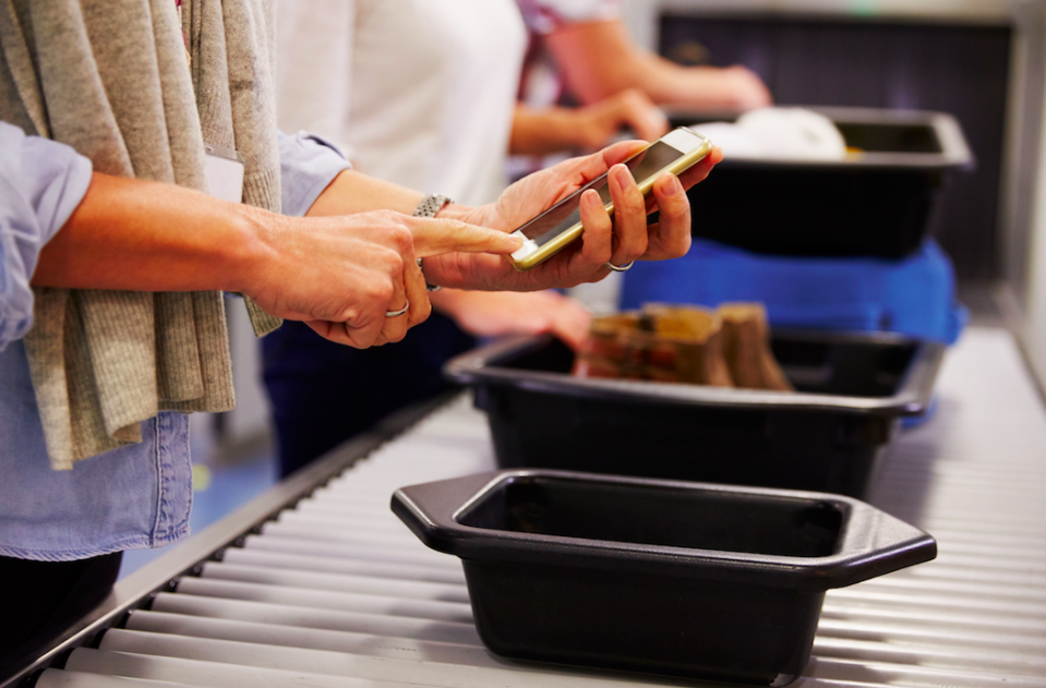 <em>Plastic security trays harbour the highest levels of viruses at airports, according to a study (Rex)</em>