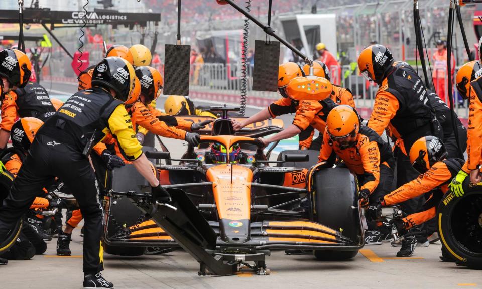 <span>McLaren mechanics work on Oscar Piastri’s car during the Chinese Grand Prix.</span><span>Photograph: DPPI/Shutterstock</span>