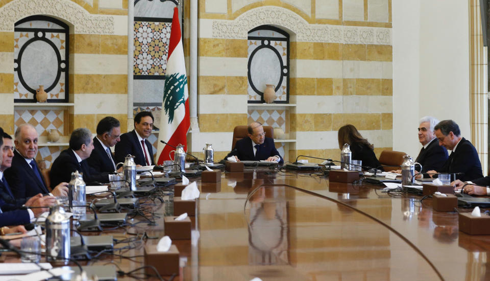 Lebanon's President Michel Aoun heads the first meeting of the new cabinet at the presidential palace in Baabda