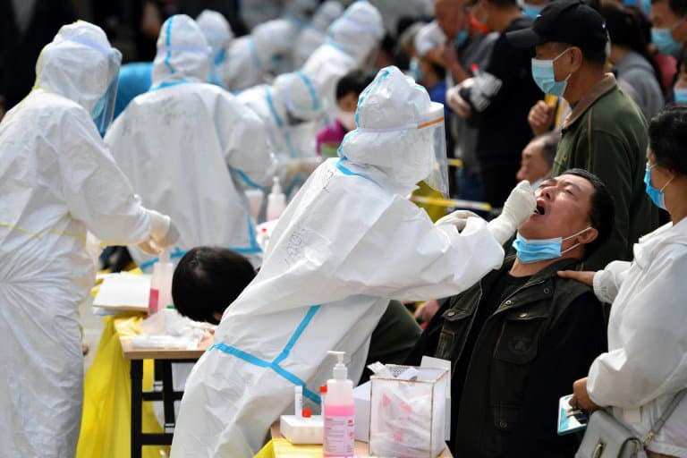 Tests du Covid-19 dans le cadre d'un dépistage massif en Chine, le 13 octobre 2020 (Photo d'illustration) - STR © 2019 AFP