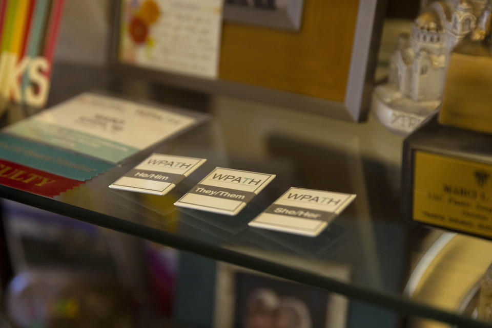 Pronoun pins in Dr. Marci Bowers’ office. (Preston Gannaway for NBC News)