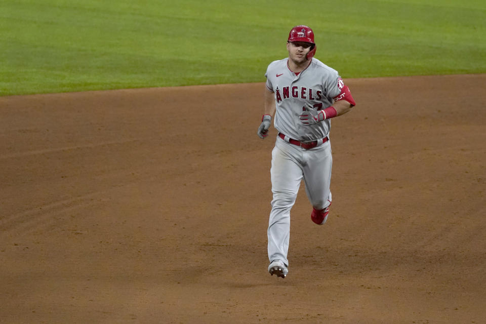 Los Angeles Angels' Mike Trout jogs around the bases after hitting a solo home run in the fifth inning of a baseball game against the Texas Rangers in Arlington, Texas, Thursday, Sept. 10, 2020. (AP Photo/Tony Gutierrez)