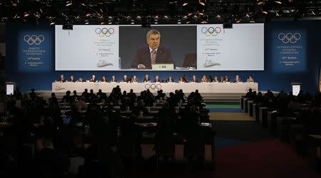 International Olympic Committee (IOC) President Thomas Bach delivers a speech during the opening of the 127th IOC session in Monaco December 8, 2014. REUTERS/Eric Gaillard