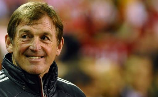 Liverpool's Scottish manager Kenny Dalglish arrives for the English Premier League football match between Liverpool and Everton at Anfield. Steven Gerrard marked his return to Liverpool's starting line-up with a hat-trick as Dalglish's side returned to winning ways with a 3-0 win over Everton in the Merseyside derby on Tuesday