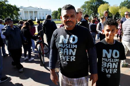Protesters gather outside the White House for "NoMuslimBanEver" rally against what they say is discriminatory policies that unlawfully target American Muslim and immigrant communities, in Washington, U.S., October 18, 2017. REUTERS/Yuri Gripas