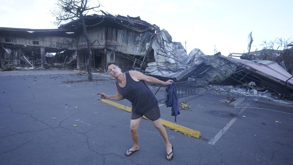 Lahaina resident Kyle Scharnhorst describes running from his burning apartment on Friday, Aug. 11, 2023, in Lahaina, Hawaii. Hawaii emergency management records show no indication that warning sirens sounded before people ran for their lives from wildfires on Maui that wiped out a historic town. | Rick Bowmer, Associated Press