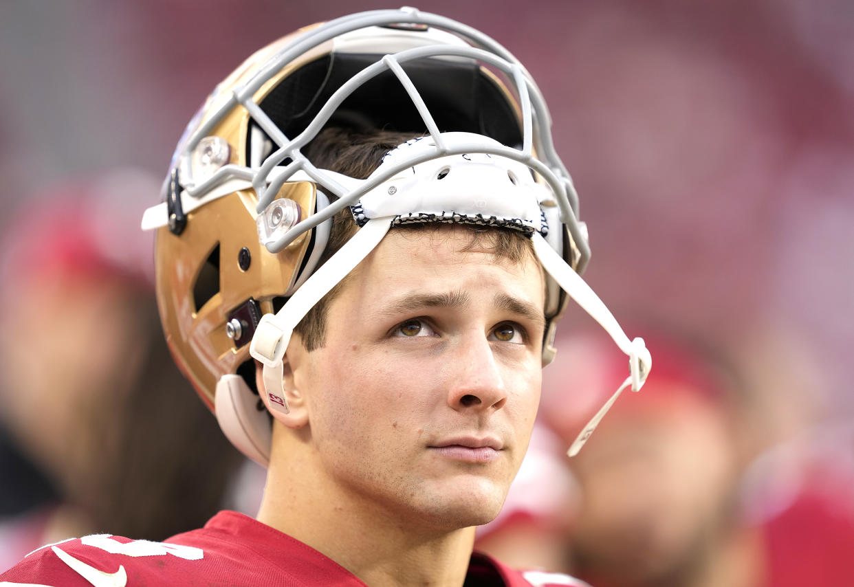 Brock Purdy has handled every challenge he's faced as the 49ers' rookie quarterback. Can he stand up against a fierce Cowboys defense? (Photo by Thearon W. Henderson/Getty Images)