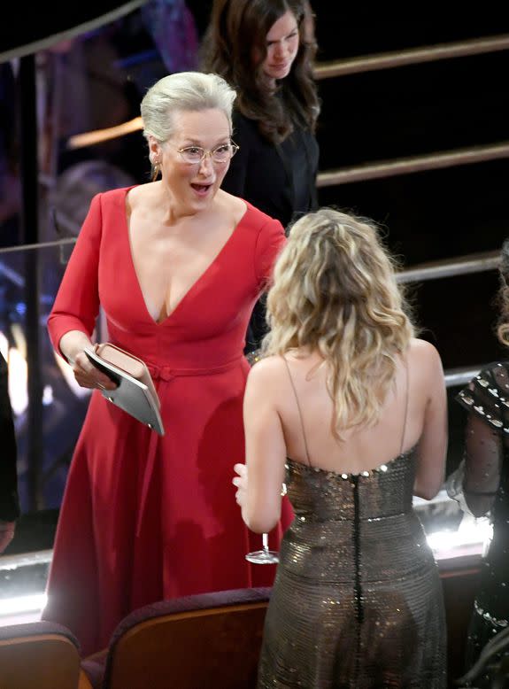 HOLLYWOOD, CA - MARCH 04:  Actors Meryl Streep (L) and Jennifer Lawrence speak in the audience during the 90th Annual Academy Awards at the Dolby Theatre at Hollywood & Highland Center on March 4, 2018 in Hollywood, California.  (Photo by Kevin Winter/Getty Images)