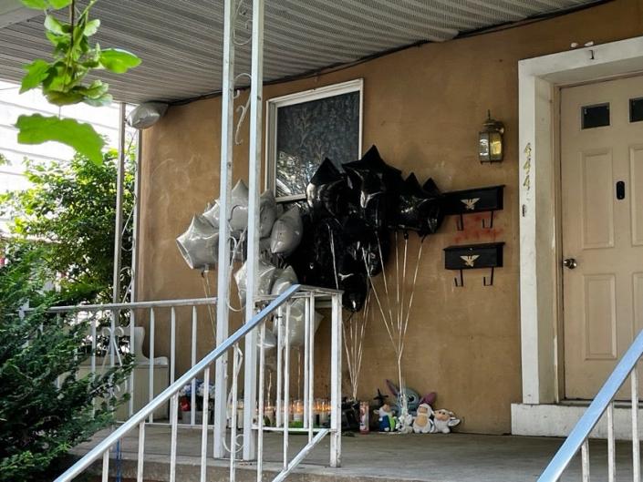 A memorial was set up on the front porch of where the shooting took place, June 1.