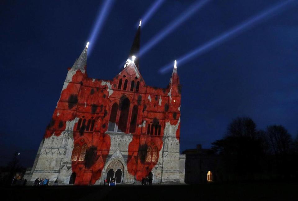 The Royal British Legion’s Falling Poppies projection is displayed on the West Front of Salisbury Cathedral (Andrew Matthews/PA)