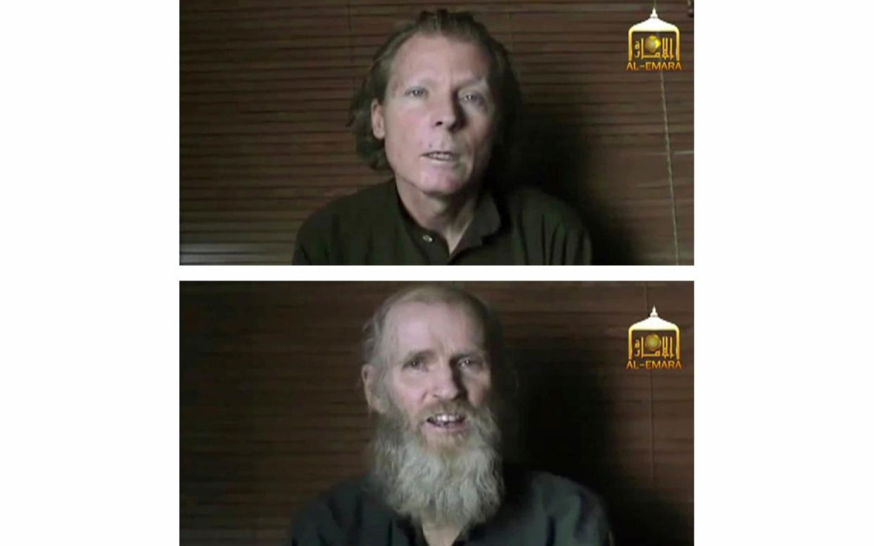 Australian Timothy Weeks, top, and American Kevin King, shown in a 2017 Taliban hostage video - EL EMARA TALIBAN