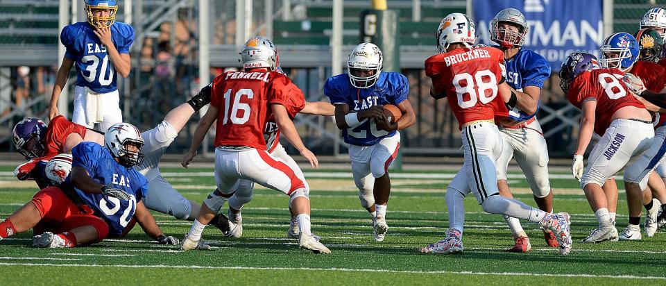 Action from the 30th annual Repository East-West All-Star Football Game at GlenOak, July 20, 2019.