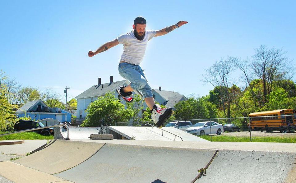 Wearing inline skates, Phil Kane, of Weymouth, tries to execute leaps and landings at the Weymouth skatepark on May 18, 2016.