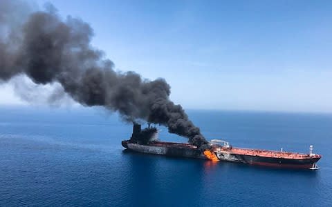 Two oil tankers near the strategic Strait of Hormuz were reportedly attacked on Thursday, an assault that left one ablaze and adrift as sailors were evacuated from both vessels - Credit: AP