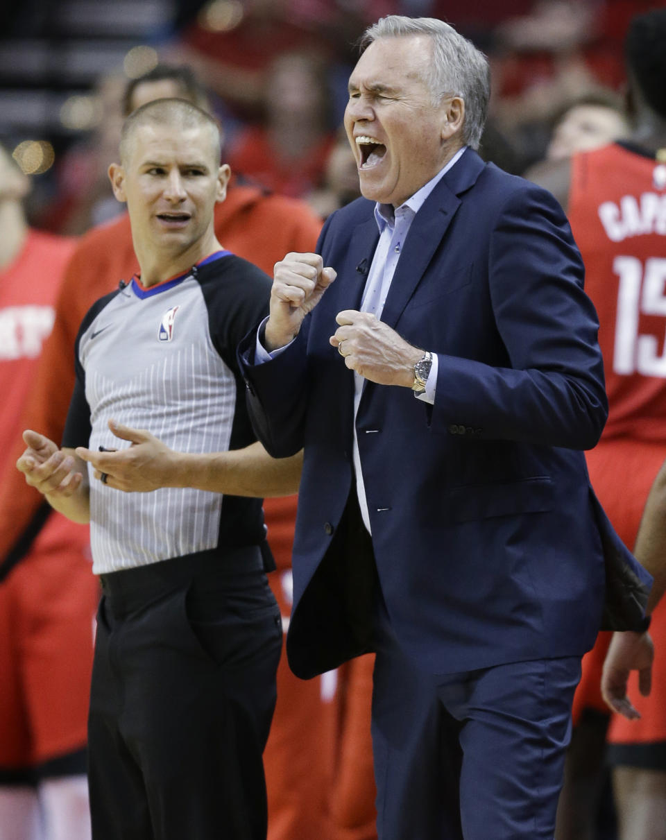 Houston Rockets coach Mike D'Antoni, right, argues a call with referee Tyler Ford during the first half of the team's NBA basketball game against the Milwaukee Bucks, Thursday, Oct. 24, 2019, in Houston. (AP Photo/Eric Christian Smith)