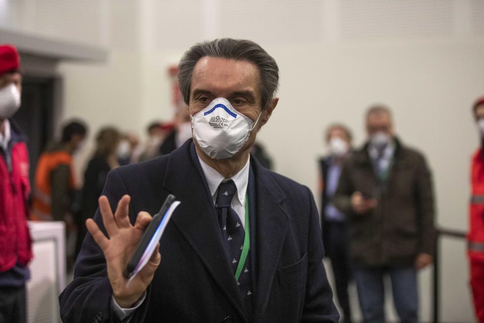 Lombardy region president Attilio Fontana arrives to attend a news conference presenting a new hospital Ospedalefieramilano to treat coronavirus patients in Milan, Italy, Tuesday, March 31, 2020. As Italy prepares to emerge from the West’s first and most extensive coronavirus lockdown, it is increasingly becoming apparent that something went terribly wrong in Lombardy, the hardest-hit region in Europe’s hardest-hit country. The intensive care hospital was unveiled to great fanfare on March 31, the fruit of a 21 million euro fundraising campaign spearheaded by Lombardy’s Fontana, of the right-wing League party, to try to relieve pressure on the region’s overtaxed ICUs which on that date were near capacity at 1,324 patients. In the end, the Milan field hospital was barely used, treating only a few dozen patients. (AP Photo/Luca Bruno)