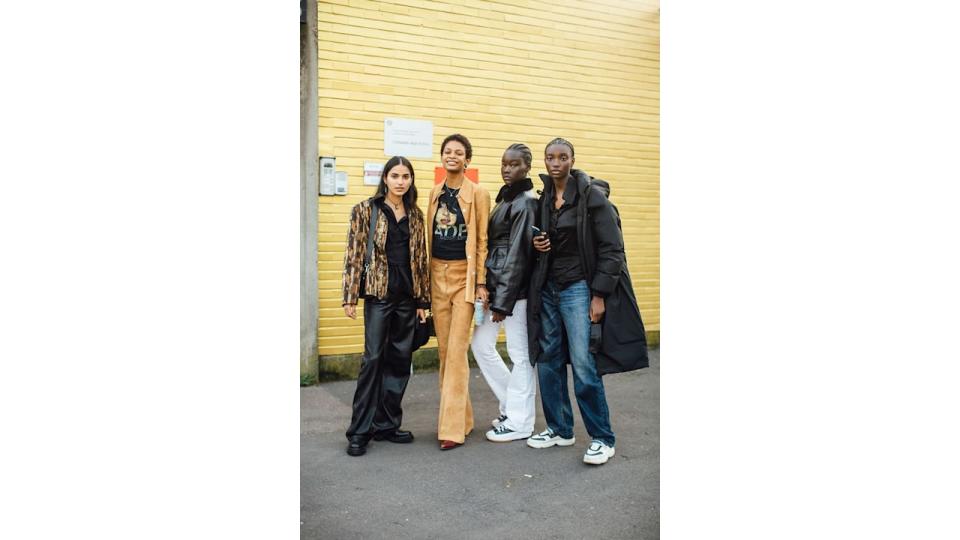 Models post-show at Milan Fashion Week 