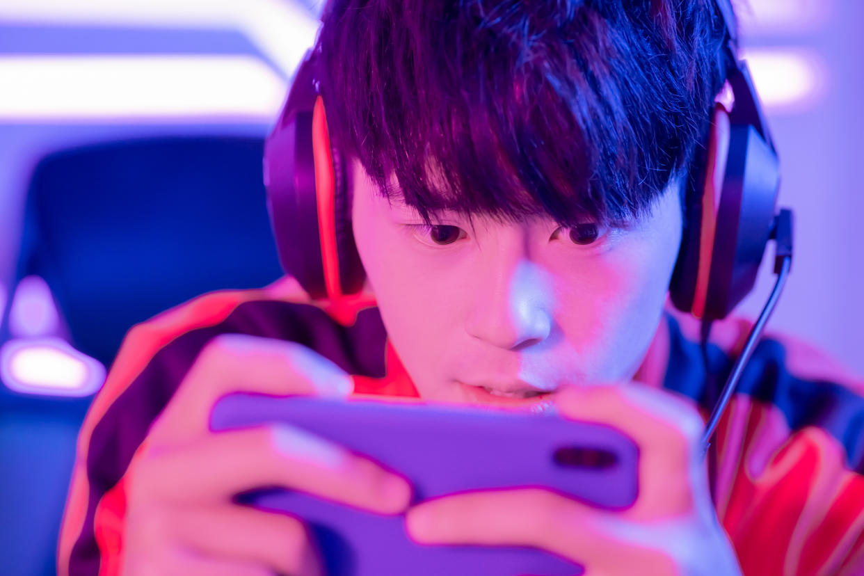 Stock image of a mobile game player. MLBB Team OP dropped four of their players for discriminatory remarks made during a streamed ranked game. (Photo: Getty Images)