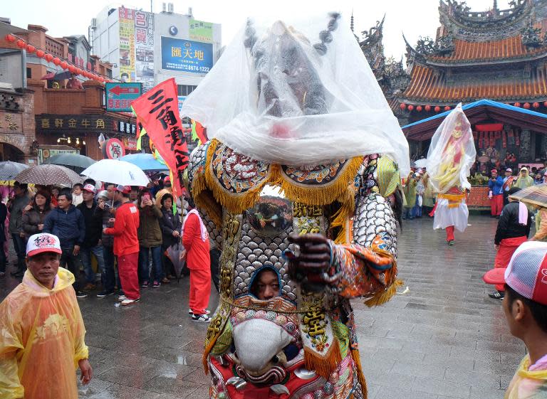 The controversial "Holy Pig" festival sees giant overfed pigs displayed at temples across Taiwan, in a contest deplored by animal rights campaigners