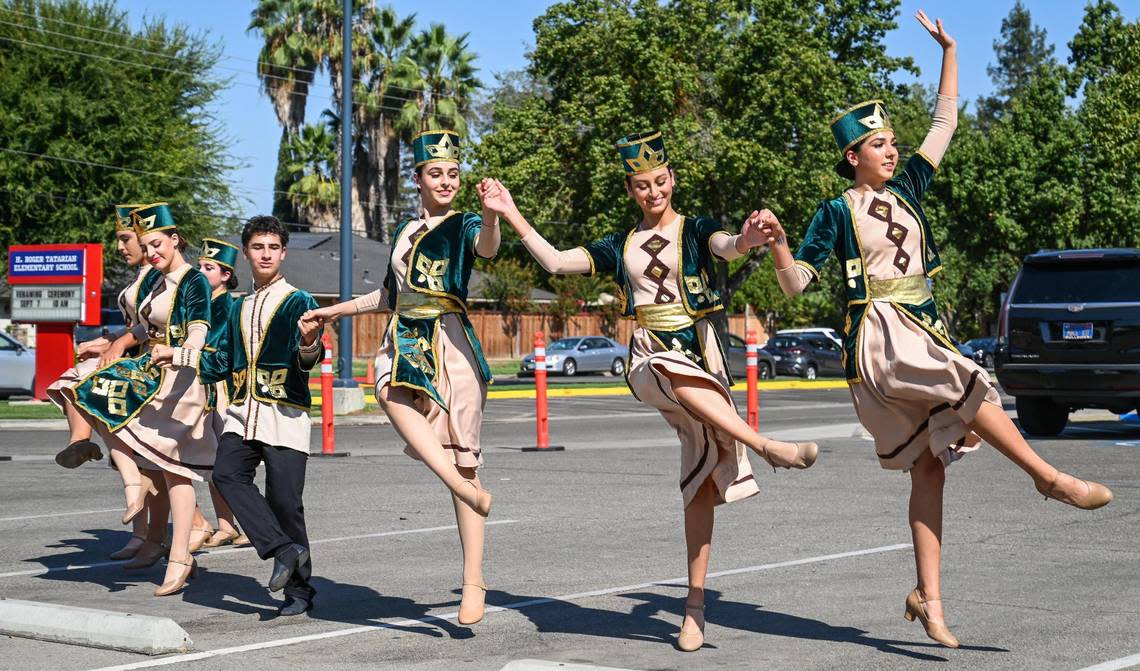 Members of the Armenian Dance Group of Fresno perform during a renaming ceremony at H. Roger Tatarian Elementary School in north Fresno on Wednesday, Sept. 7, 2022. The renaming ceremony was held to honor its namesake and the Fresno Armenian community he belonged to.