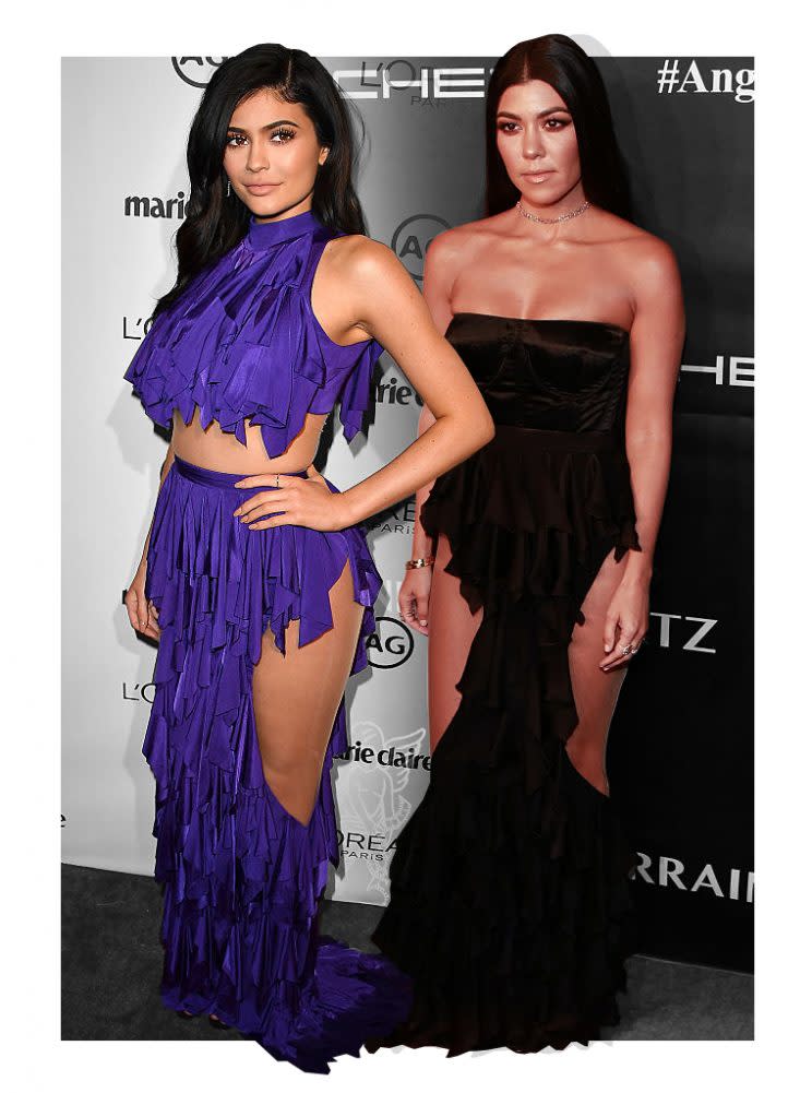 Kylie Jenner and sister Kourtney Kardashian are both fans of cutout dresses. (Photo: Getty Images)