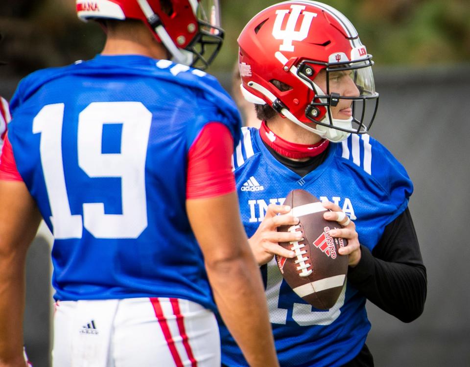 Indiana's Brendan Sorsby (15) drops back to pass during the first day of fall camp for Indiana football at their practice facilities on Wednesday, Aug. 2, 2023.