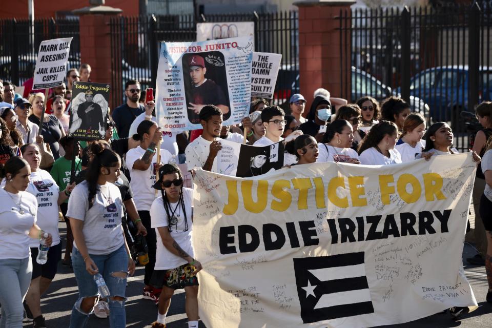 FILE - Groups hold a rally in support of Eddie Irzarry in Philadelphia on Aug. 31, 2023. A judge has reinstated all charges, including a murder count, against the former officer who shot and killed a driver, Irzarry, through a rolled-up car window — a confrontation police initially described as the officer shooting the driver after he lunged at him with a knife outside the car. Common Pleas Court Judge Lillian Ransom ruled Wednesday, Oct. 25, 2023 after a hearing that the facts of the case should be established at a trial. (Elizabeth Robertson/The Philadelphia Inquirer via AP, File)