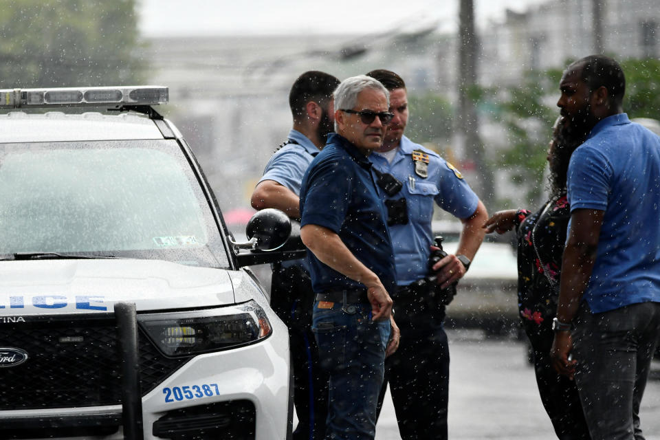 Police officers work at the scene the day after a shooting in the Kingsessing section of southwest Philadelphia, Pennsylvania, July 4, 2023. / Credit: BASTIAAN SLABBERS / REUTERS