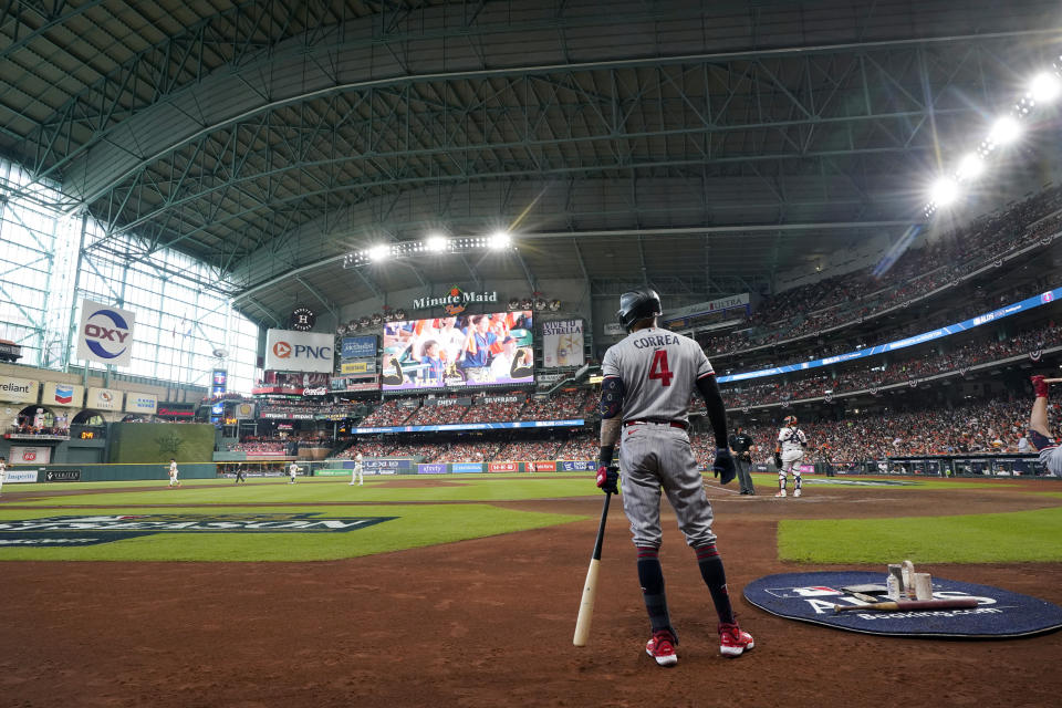Minnesota Twins' Carlos Correa prepares to bat during the second inning in Game 1 of an American League Division Series baseball game against the Houston Astros, Saturday, Oct. 7, 2023, in Houston. (AP Photo/Tony Gutierrez)