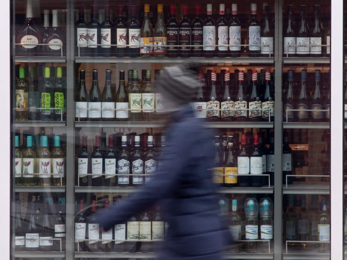 Shelves filled with bottles on display at an LCBO outlet in Ottawa. Alcohol is the leading cause of preventable death and disease in Canada. (Adrian Wyld/Canadian Press - image credit)