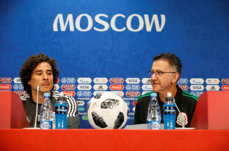 Soccer Football - World Cup - Mexico Press Conference - Luzhniki Stadium, Moscow, Russia - June 16, 2018 Mexico coach Juan Carlos Osorio with Guillermo Ochoa during the press conference REUTERS/Gleb Garanich