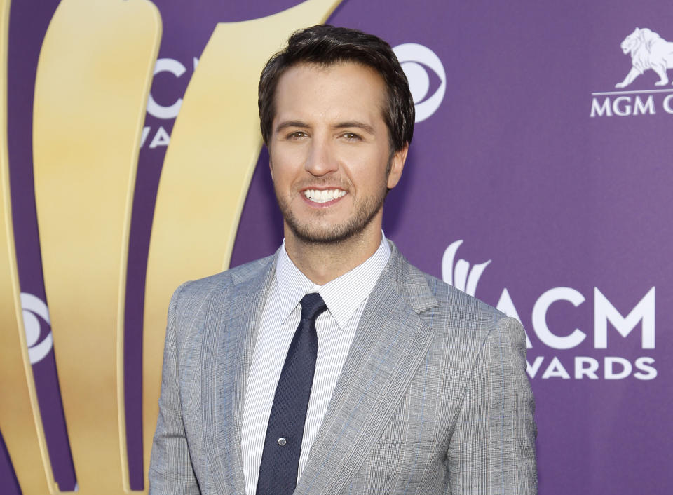 FILE - This April 1, 2012 file photo shows country singer Luke Bryan at the 47th Annual Academy of Country Music Awards in Las Vegas. Bryan is joining Blake Shelton to co-host the 2013 Academy of Country Music Awards on April 7. Bryan replaces Reba McEntire, who served as host for more than a decade before stepping aside to concentrate on her new sit-com “Malibu Country.” (AP Photo/Isaac Brekken, file)