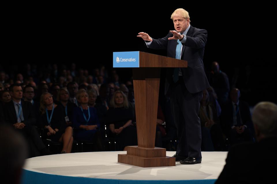 Britain's Prime Minister Boris Johnson delivers his keynote speech to delegates on the final day of the annual Conservative Party conference at the Manchester Central convention complex, in Manchester, north-west England on October 2, 2019. - Prime Minister Boris Johnson was set to unveil his plan for a new Brexit deal at his Conservative party conference Wednesday, warning the EU it is that or Britain leaves with no agreement this month. Downing Street said Johnson would give details of a "fair and reasonable compromise" in his closing address to the gathering in Manchester, and would table the plans in Brussels the same day. (Photo by Oli SCARFF / AFP) (Photo by OLI SCARFF/AFP via Getty Images)