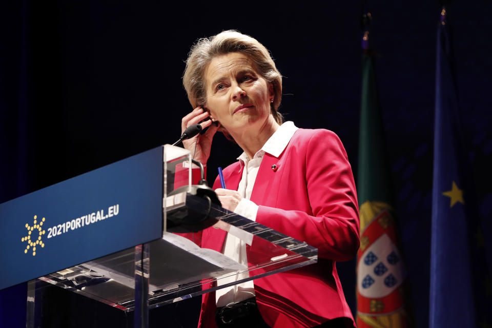 European Commission President Ursula Von Der Leyen adjusts her earphone during a joint news conference with Portuguese Prime Minister Antonio Costa at the Belem Cultural Center in Lisbon, Friday, Jan. 15, 2021. The Portuguese presidency of the EU is receiving the College of Commissioners of the European Commission for a round of meetings. (AP Photo/Armando Franca)