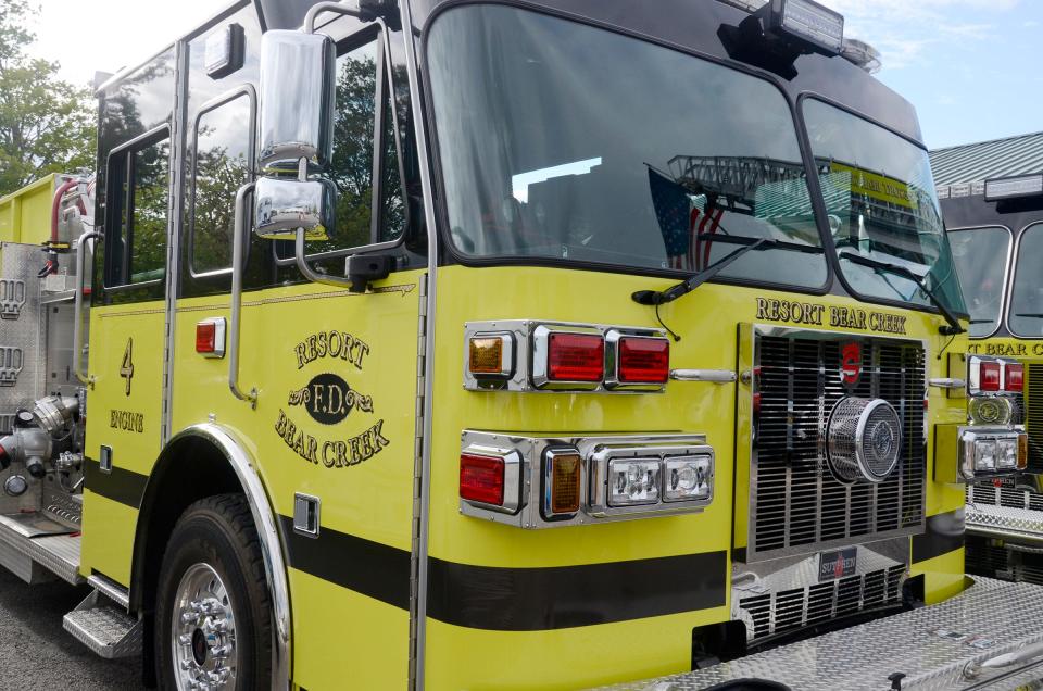 A Resort-Bear Creek Fire Department truck is shown.