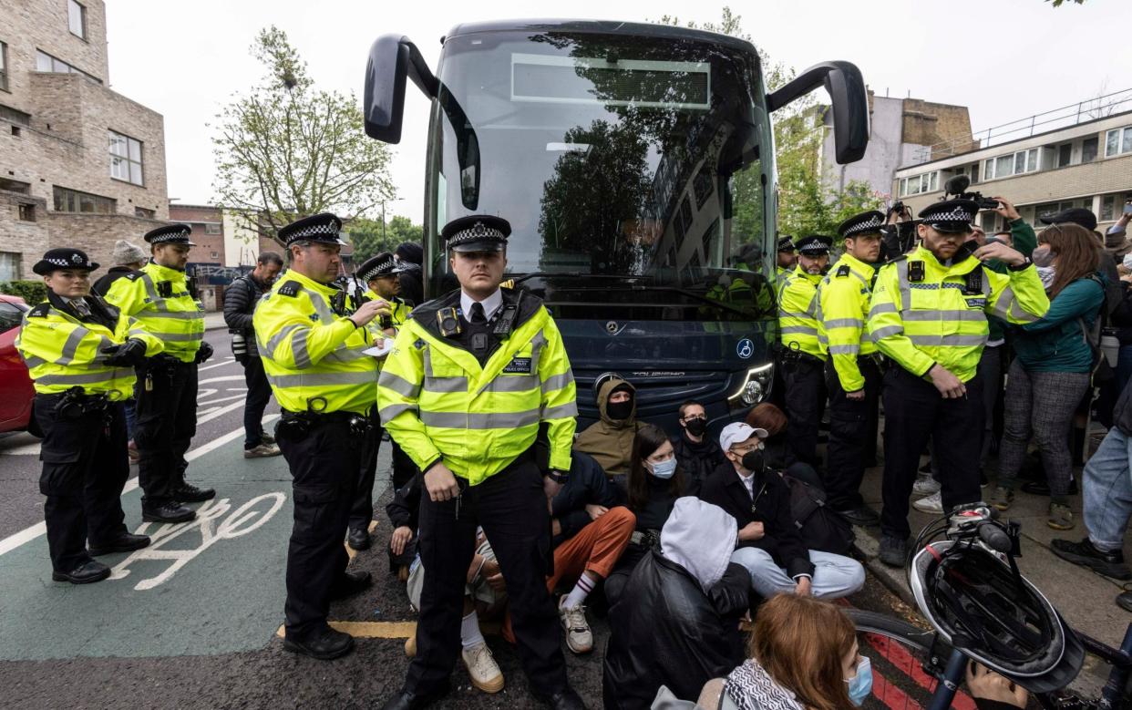 Police surround the bus