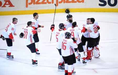 Sep 29, 2016; Toronto, Ontario, Canada; Team Canada players celebrate on the ice after defeating Team Europe 2-1 in game two of the World Cup of Hockey final to win the tournament at Air Canada Centre. Mandatory Credit: Dan Hamilton-USA TODAY Sports