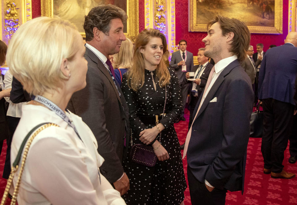 LONDON, ENGLAND - JUNE 12: Princess Beatrice of York and her boyfriend Edoardo Mapelli Mozzi speak with guests during a Pitch@Palace event, hosted by Prince Andrew, Duke of York at St James Palace on June 12, 2019 in London, England. (Photo by Steve Parsons – WPA Pool/Getty Images)