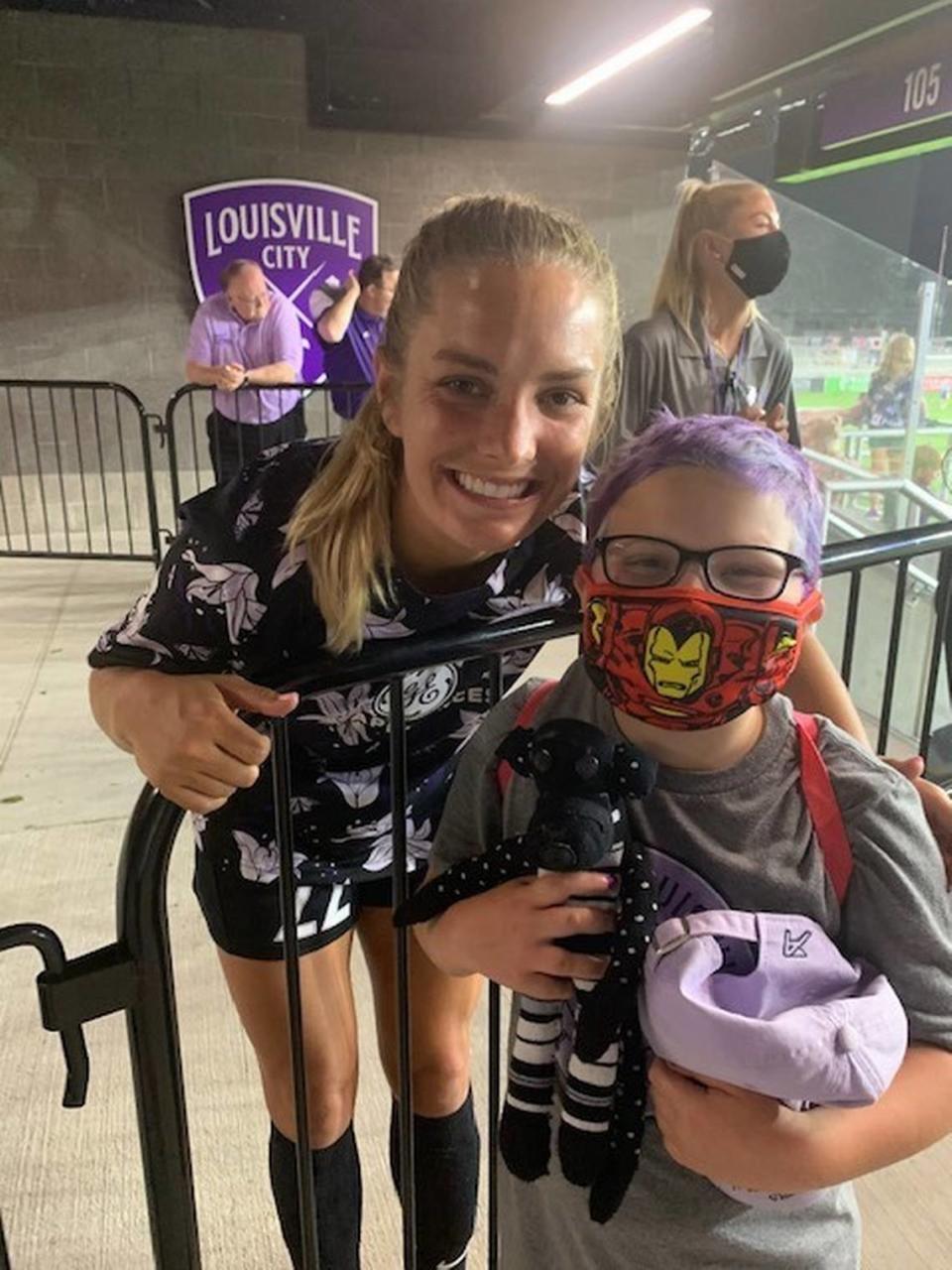 Ellie Hurley, right, poses with Louisville Racing Football Club forward Katie McClure. Photo courtesy of Morgan Hurley.