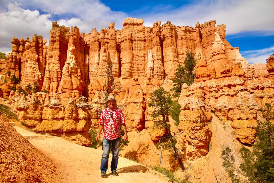 Meander among towering hoodoos in the fabled Queens Garden and Navajo Loop in enticing Bryce Canyon. The 3-mile hike contains the greatest hits of the spectacles in the park. The paved walking trail, part of the Rim Trail, portrays a wide selection of spires, sandstone fins and burnt orange-colored hoodoos.