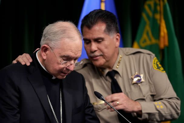 PHOTO: Los Angeles County Sheriff Robert Luna, right, hugs Archbishop of Los Angeles, Jose H. Gomez during a news conference, Feb. 20, 2023, announcing an arrest has been made in connection to the murder of bishop David O'Connell, in Los Angeles. (Damian Dovarganes/AP)