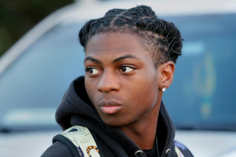 Darryl George, an 18-year-old junior looks on before walking into Barbers Hill High School after serving an in-school suspension for not cutting his hair Monday, Sept. 18, 2023, in Mont Belvieu, Texas. George will be sent to EPIC, an alternative school program, from Oct. 12 through Nov. 29 for “failure to comply” with multiple campus and classroom regulations, the principal said in a Wednesday, Oct. 11, letter provided to The Associated Press by the family. (AP Photo/Michael Wyke, File)