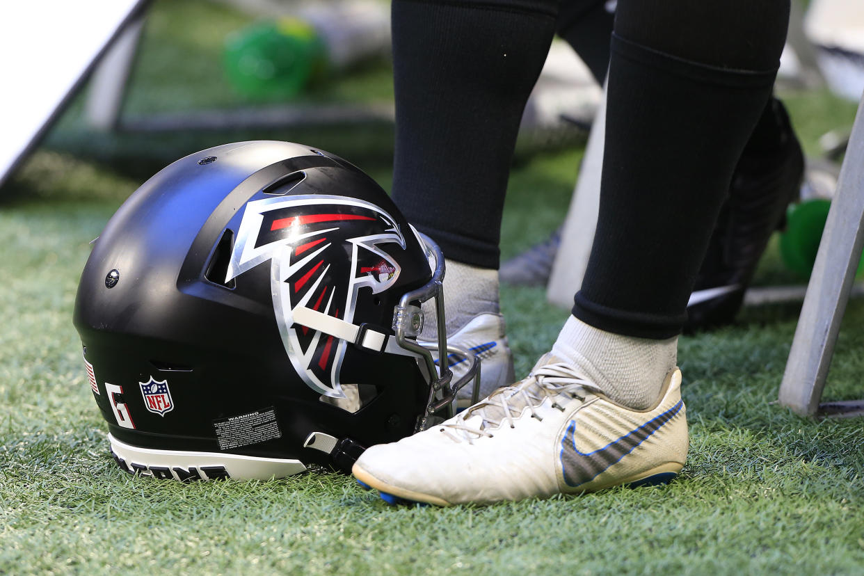 ATLANTA, GA - AUGUST 13: A Falcons helmet on the sidelines during the Friday night preseason NFL game between the Atlanta Falcons and the Tennessee Titans on August 13, 2021 at Mercedes-Benz Stadium in Atlanta, Georgia.  (Photo by David J. Griffin/Icon Sportswire via Getty Images)