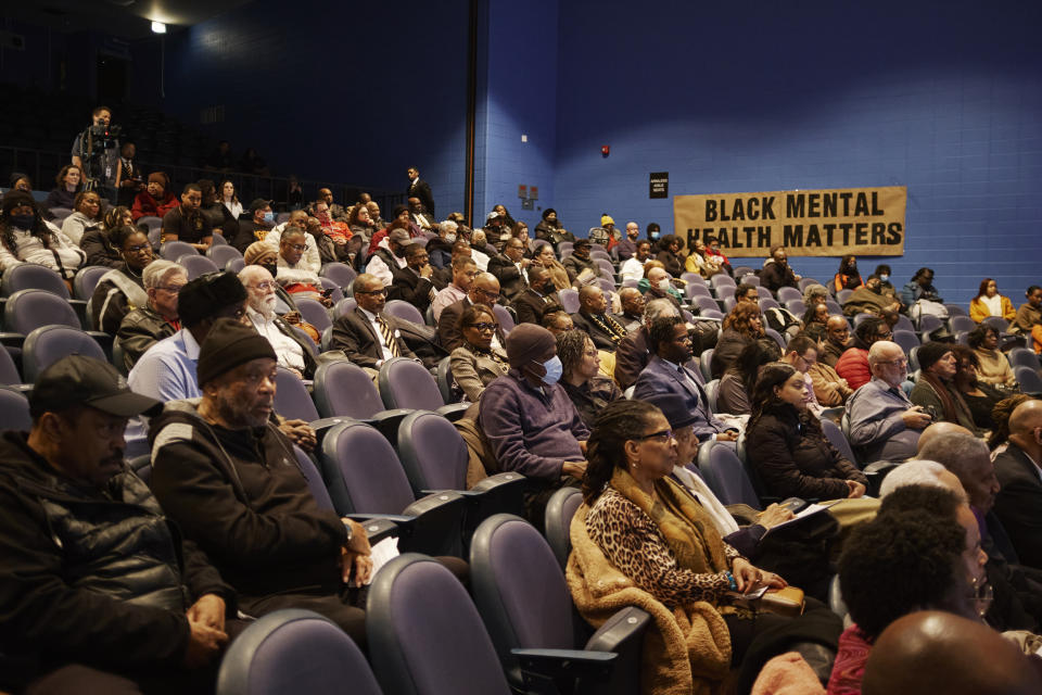 Chicagoans in an auditorium listen to a mayoral debate between Paul Vallas and Brandon Johnson at Kenwood Academy (Mustafa Hussain for NBC News)