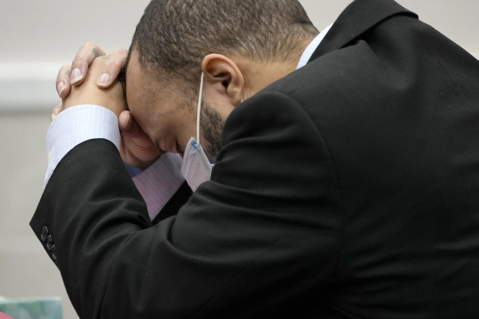 Darrell Brooks reacts as the guilty verdict is read during his trial in a Waukesha County Circuit Court in Waukesha, Wis., on Wednesday, Oct. 26, 2022. Dozens of people are expected to speak at sentencing proceedings for Brooks, who is convicted of killing six people when he drove his SUV through a Christmas parade in suburban Milwaukee last year. He will face six mandatory life terms when Judge Jennifer Dorow sentences him on Wednesday. Dorow set aside Tuesday for victims and their families to address Brooks, marking the first time they will be allowed to confront him. (Mike De Sisti/Milwaukee Journal-Sentinel via AP, Pool)