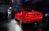 A cameraman gets video of the Volvo S60 during the inauguration of Volvo Cars first U.S. production plant in Ridgeville, South Carolina, U.S., June 20, 2018. REUTERS/Randall Hill